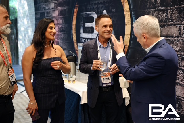 Kevin Harrington, Kevin Killoran, and Rhonda Swan chatting at Board of Advisors