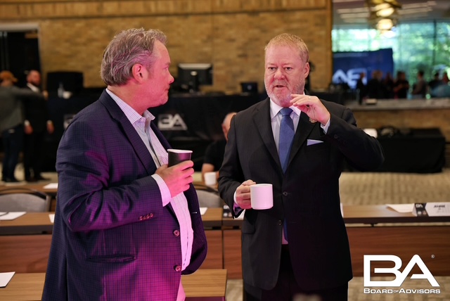 Jimmy Ralph speaking to Board of Advisors member