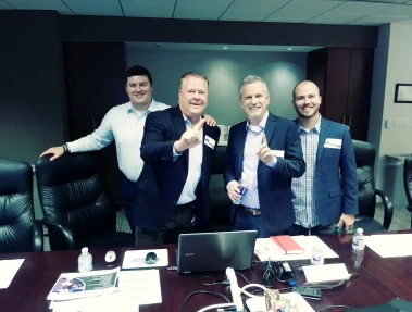 Trevor Ralph, Jimmy Ralph, Kevin Killoran, Travis Ralph pictured right to left at Metro by T-Mobile headquarters in Dallas.