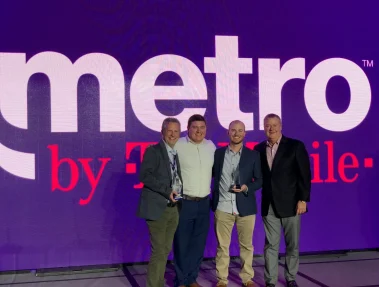 Jimmy Ralph, Travis Ralph, Trevor Ralph, Kevin Killoran (pictured right to left) accepting awards for Talk More Wireless.